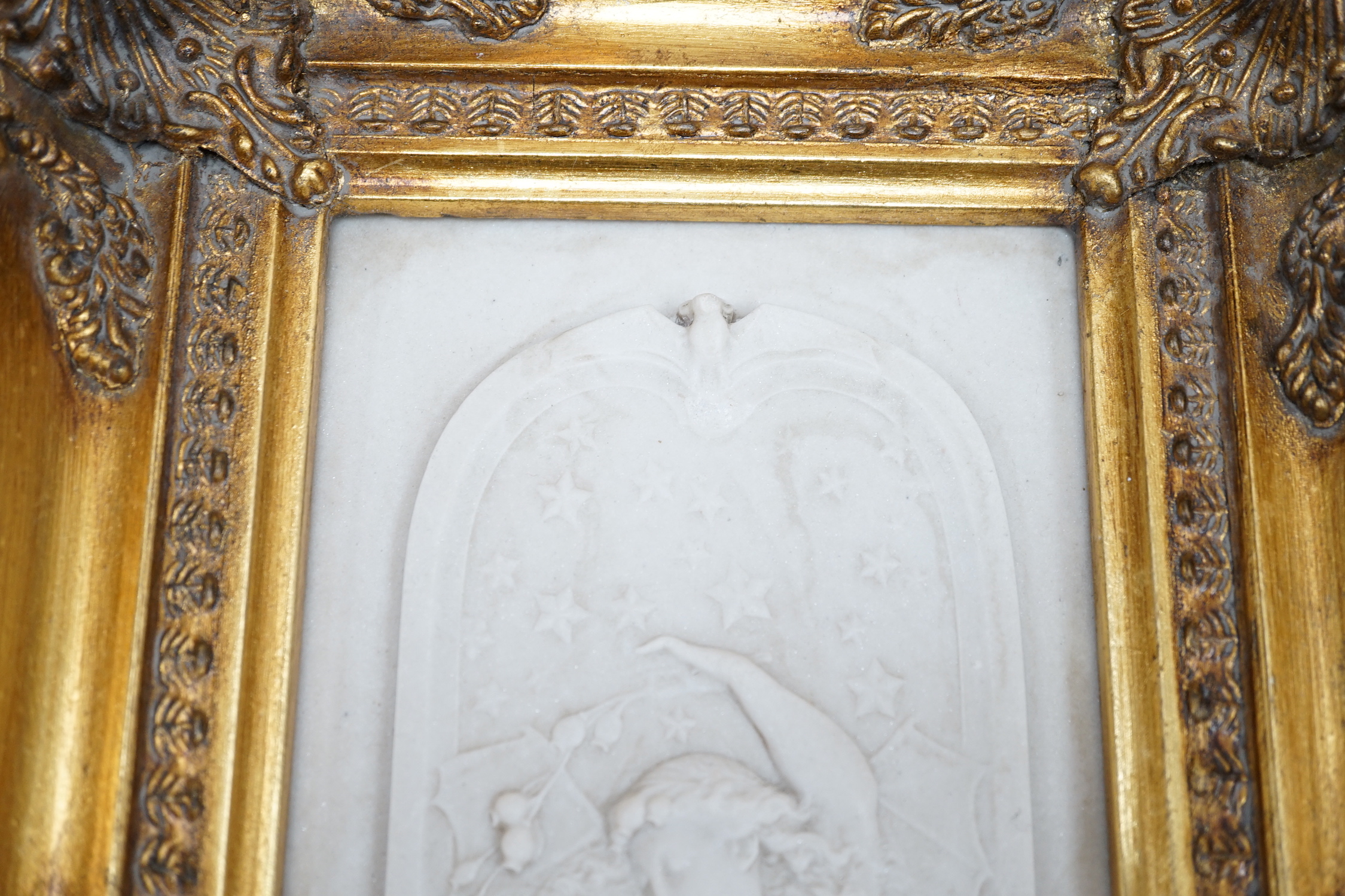 An ornate framed reconstituted stone frieze, 42 x 23cm